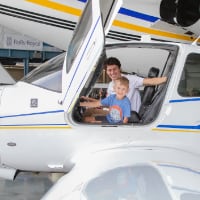Visitors at a previous Aviation Community Day in Indianapolis sat in aircraft cockpits for photos