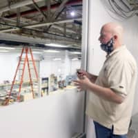 Jeff Griffin, director of Purdue Polytechnic Kokomo, showcases the basement area at Inventrek Technology Park that houses some of the Kokomo location's largest pieces of machinery and student workspaces. (Kokomo Perspective photo/Alyx Arnett)
