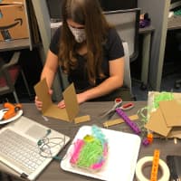 Elementary education major Rebecca Bryant works on a nest box as part of the Engineering by Design “Home Tweet Home” unit for young children. The program is designed to teach children science, technology, engineering and mathematics (STEM) more effectively by relating it to the world around them. (Photo provided)