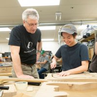 Professor Mark French works with a student on a guitar body in Purdue Polytechnic's sought-after "guitar lab" (Photo: John O'Malley/Purdue Polytechnic)