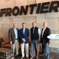 Purdue faculty with Frontier Airlines personnel