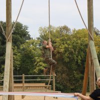 Naval ROTC midshipman Ryan Getler, training to become a Marine, completes a run on the newly-dedicated obstacle course during the September dedication. (Purdue University photo/Nick Pompella)