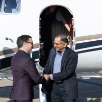 Manoj Patankar (right), head of Purdue Polytechnic's CREATE lab, arrives to meet Flexjet partners at their headquarters in Richmond Heights, Ohio. (Photo provided: Flexjet)