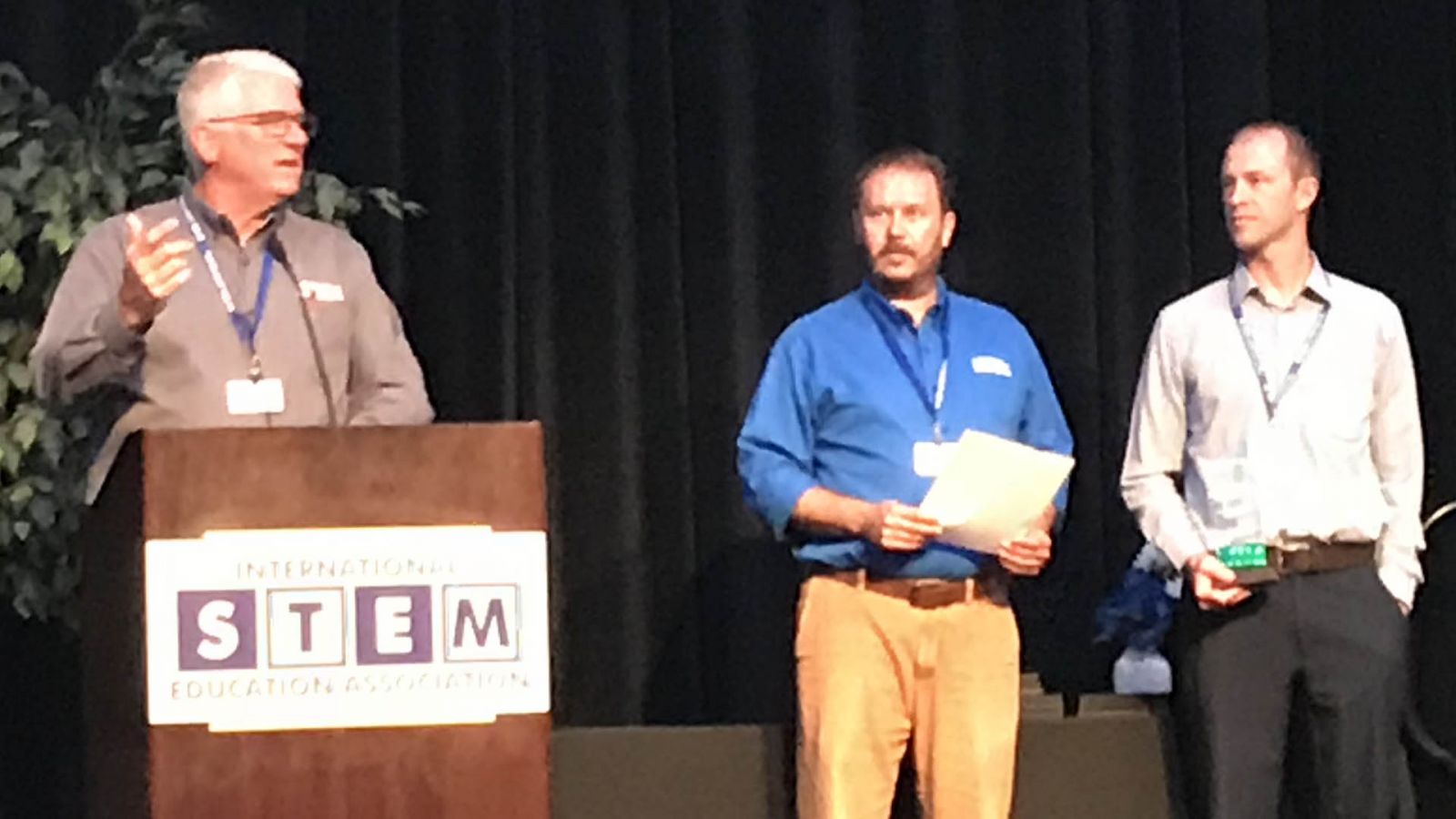Scott Bartholomew, right, receives the Mike Neden STEM Champion Award