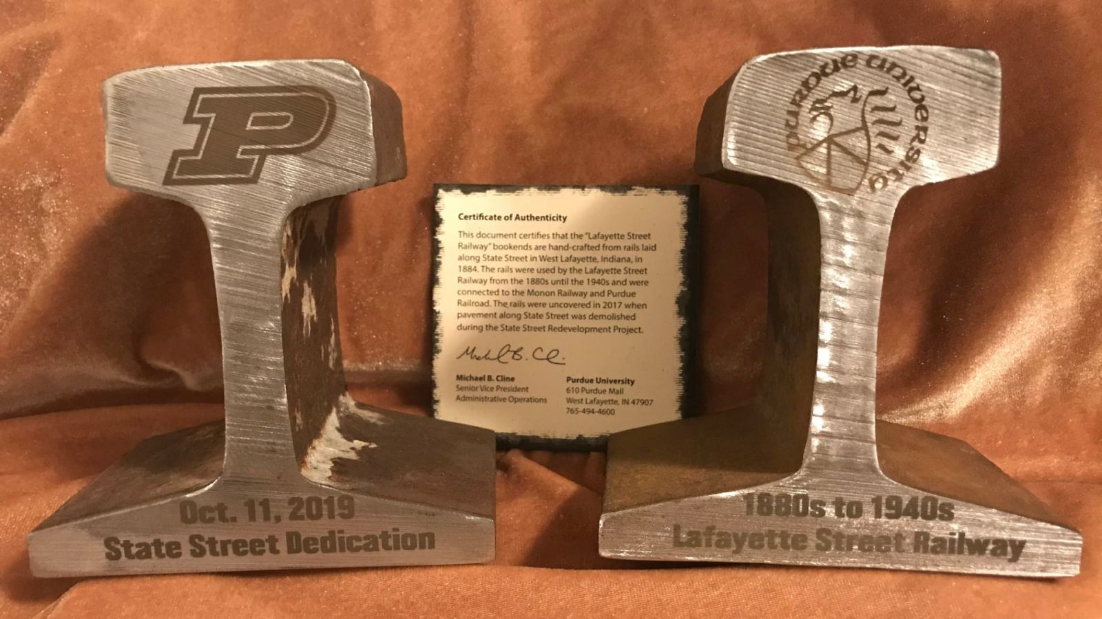 Purdue students in the Bechtel Innovation Design Center engraved cut sections of railway rails used in the Lafayette Street Railway from the 1800s to the 1940s to recognize the historic significance of the rails which were pulled from beneath State Street in 2017. (Cynthia Sequin/Purdue Research Foundation)