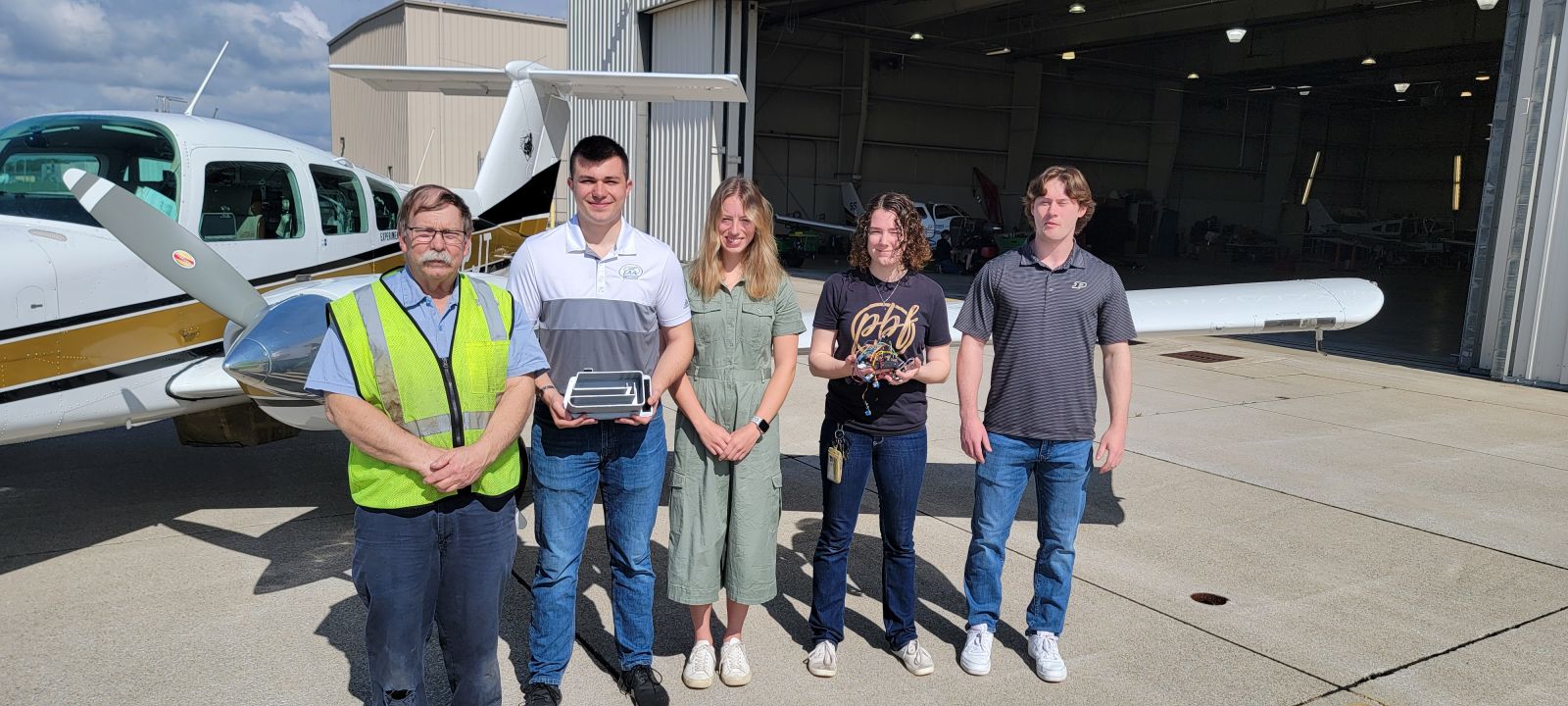 Project customer/mentor and student design team pictured left to right: Brian Stirm, Lukas Johnson, Claudia Buddenbaum, Anna Carl and Riley Hammond. (Photo provided/Timothy Ropp)