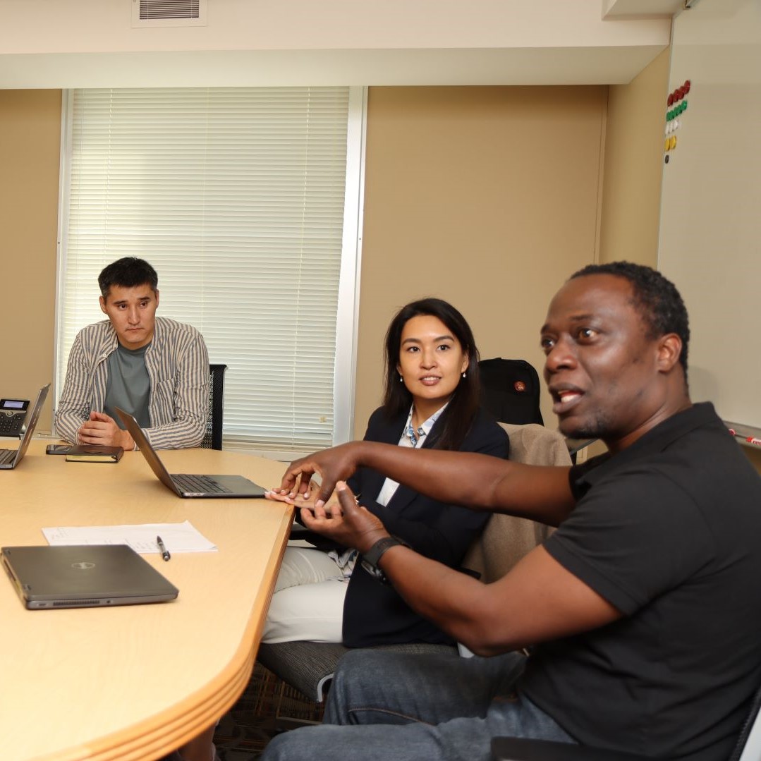 Dauletyarov (left) and Kassymova meet with Asunda on the Purdue campus in late 2023. (Purdue University photo/John O'Malley)