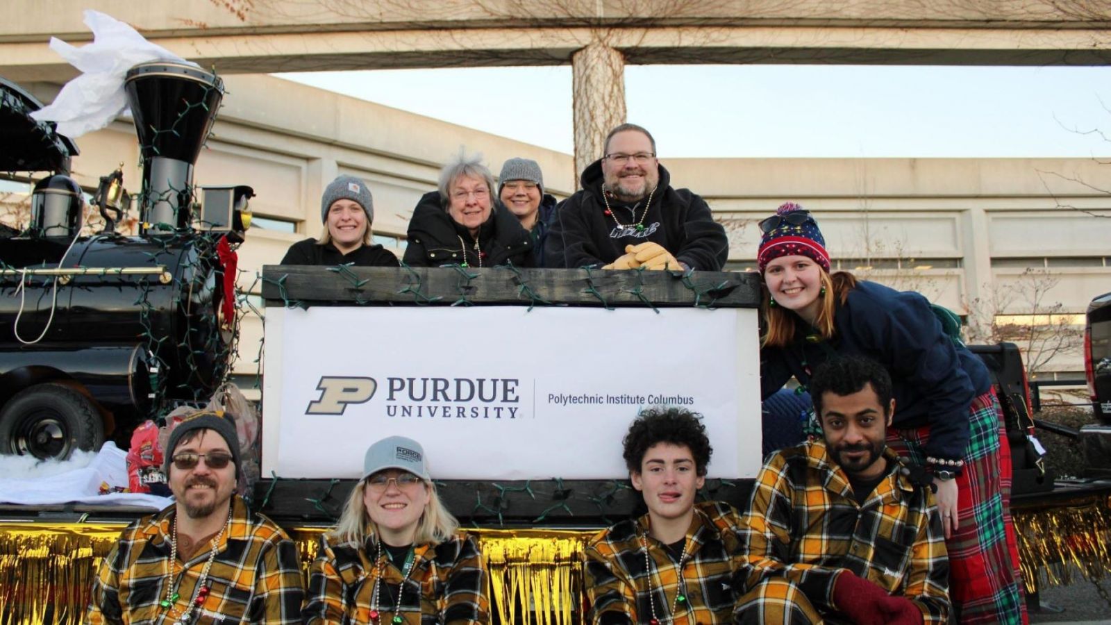 Purdue Polytechnic in Columbus faculty, staff, and students collectively turn out for events in the community, such as winter-season parades. (Purdue University photo)