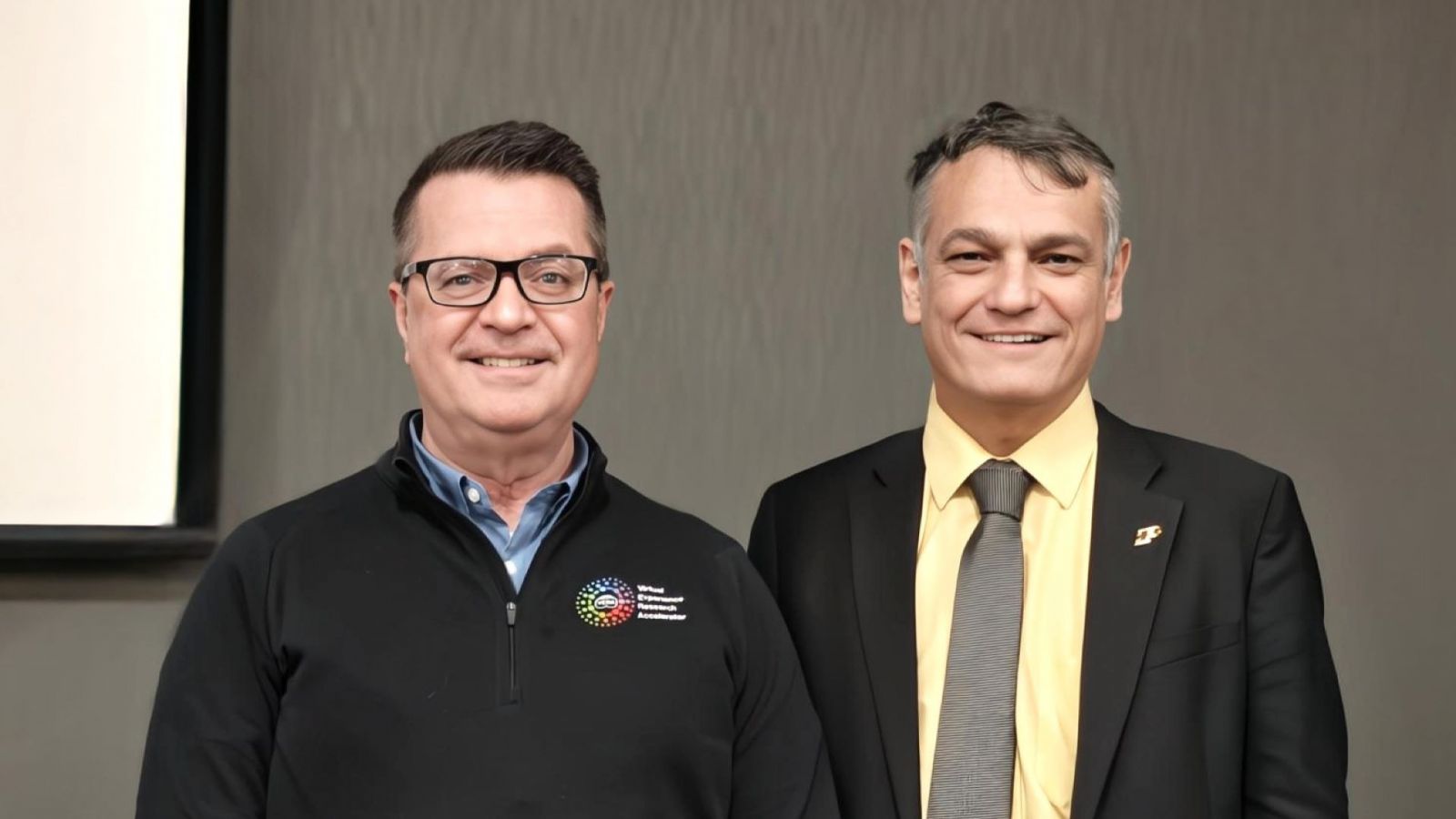 Dr. Welch (left) with Purdue Polytechnic's Dean Daniel Castro during the April 17 installment of the lecture series. (Photo provided: Justin Yang)