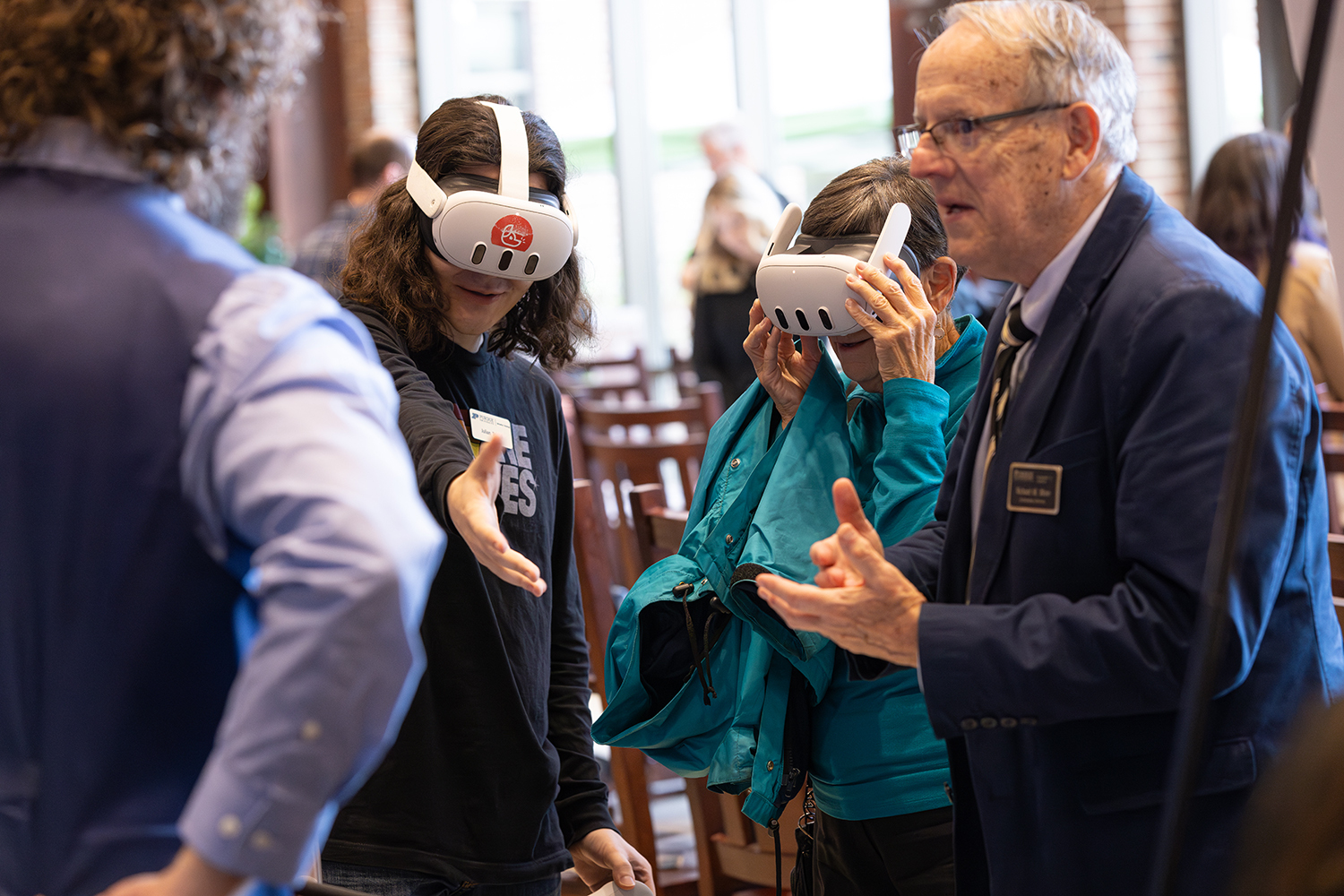Triveri demonstrating VR to attendees at Purdue's 2024 Festival of Teaching and Learning (Photo credit: RCAC)