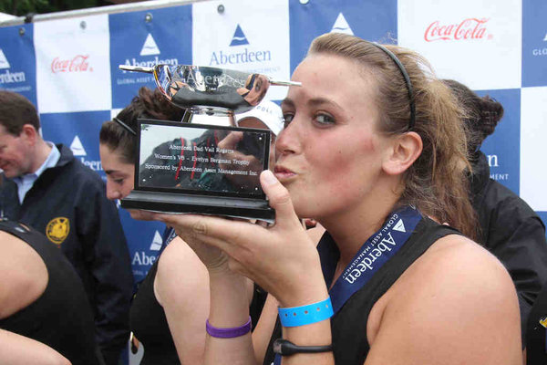 Rachel Young , the No. 4 seat of Purdue’s varsity eight, kisses the trophy presented to the team after it won the final. Rachel Young , the No. 4 seat of Purdue’s varsity eight, kisses the trophy presented to the team after it won the final.